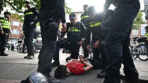 Celebrations and bottle-throwing on Dutch streets after dramatic Morocco win