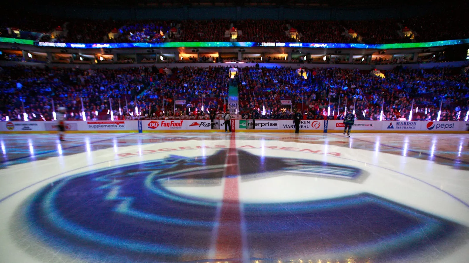VANCOUVER, BC - NOVEMBER 20: The Vancouver Canucks centre-ice logo is illuminated during the NHL game against the Anaheim Ducks at Rogers Arena November 20, 2014 in Vancouver, British Columbia, Canada. (Photo by Jeff Vinnick/NHLI via Getty Images)(Jeff Vinnick/NHLI via Getty Images)