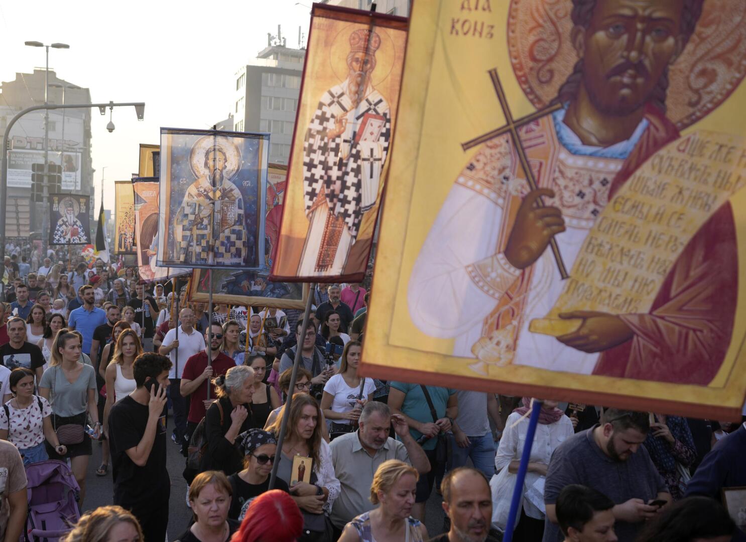 People march during a protest against the international LGBT event EuroPride in Belgrade, Serbia, on Aug. 28, 2022.