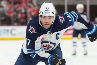 Adam Lowry on rebuilding his game, Connor Hellebuyck’s future and the Jets’ playoff hopes