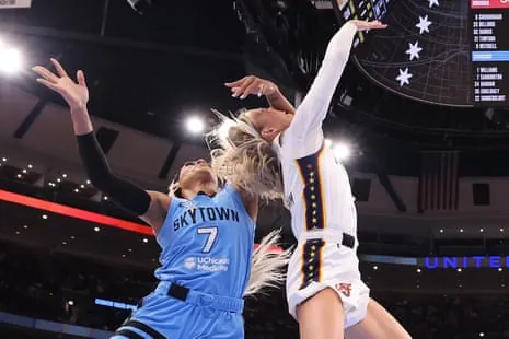 Indiana’s Sophie Cunningham is fouled by Chicago’s DiJonai Carrington during the first half of Saturday’s game at the United Center in Chicago.